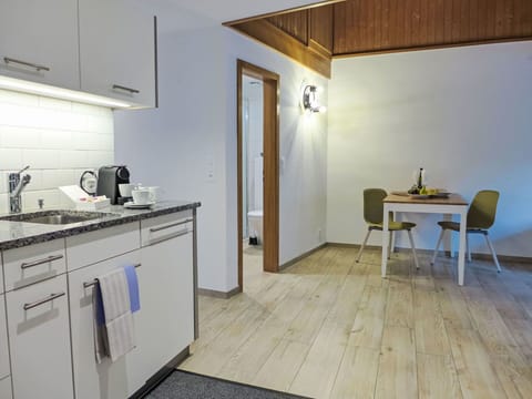 Interior Design, Flooring, Floor, Wood, Furniture, Ceiling, Room, Countertop, Kitchen, Plumbing Fixture