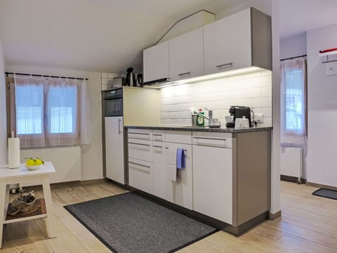 Kitchen, Interior Design, Kitchen Appliance, Major Appliance, Flooring, Furniture, Wood, Countertop, Floor, Ceiling