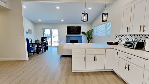 Living Room open concept with Dining, Kitchen and entry
