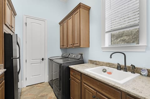 Utility room behind kitchen