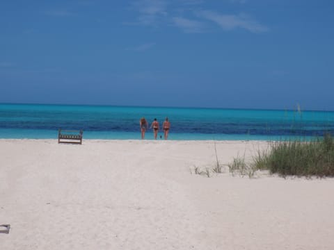 On the beach, sun loungers, beach towels