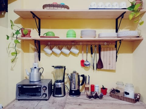 Fridge, stovetop, coffee/tea maker, electric kettle