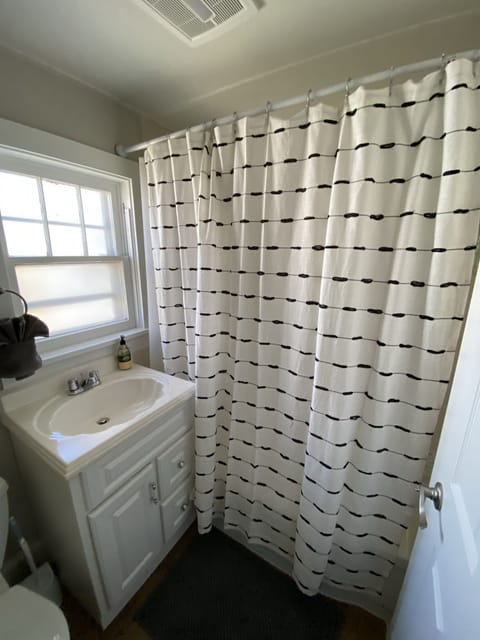 Combined shower/tub, hair dryer, towels, soap