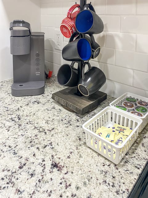 Microwave, dishwasher, coffee/tea maker, cookware/dishes/utensils