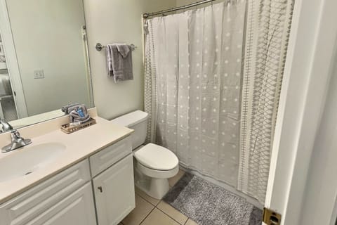 Combined shower/tub, hair dryer, towels, soap