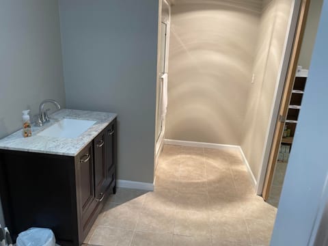 Combined shower/tub, hair dryer, towels, toilet paper