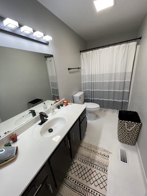 Combined shower/tub, hair dryer, towels, soap