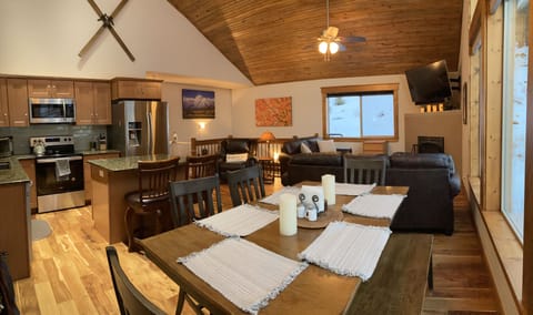 A full view of the upstairs, dining room, living room and kitchen.