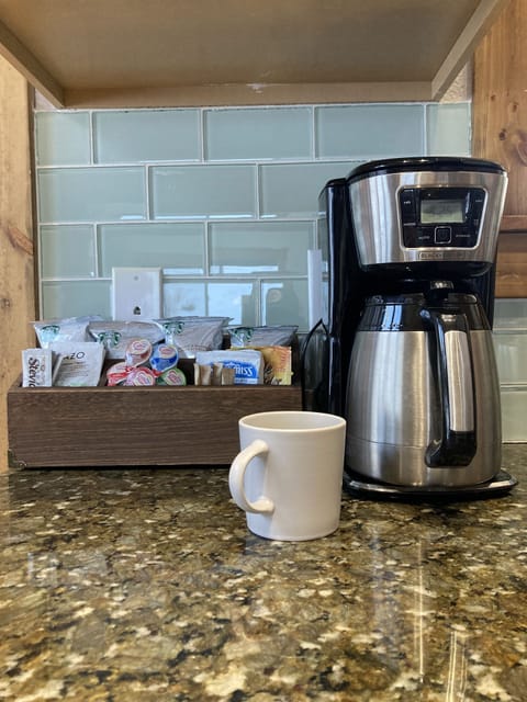 The coffee bar stocked with tea, coffee and hot coco.
