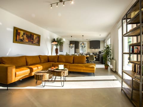 Furniture, Couch, Table, Picture Frame, Houseplant, Wood, Studio Couch, Building, Plant, Comfort