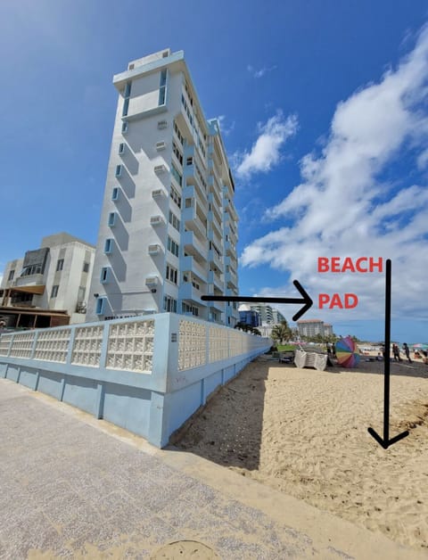 On the beach, sun loungers, beach towels