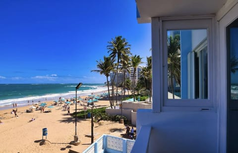 On the beach, sun loungers, beach towels