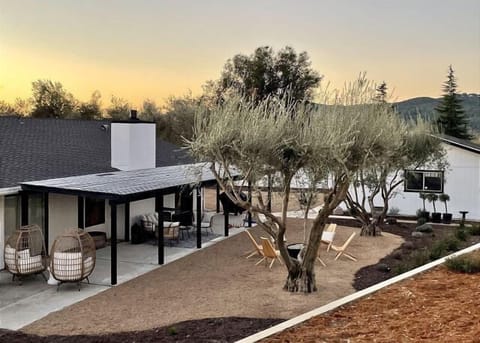 The chic, modern farmhouse vibe is an invitation to relax on