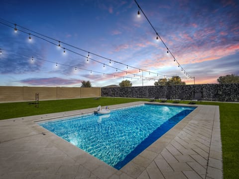 Pool and bistro lights automatically turn on at dusk and stay on until midnight.