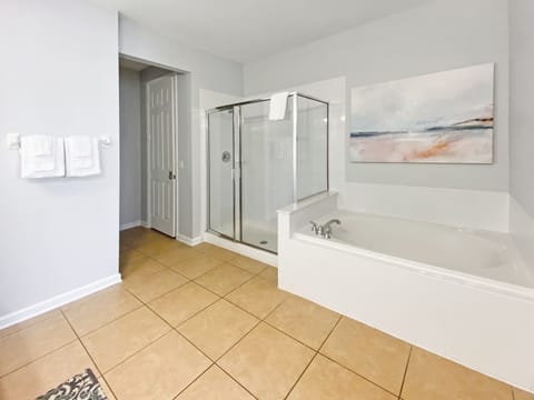 Combined shower/tub, hair dryer, towels, soap