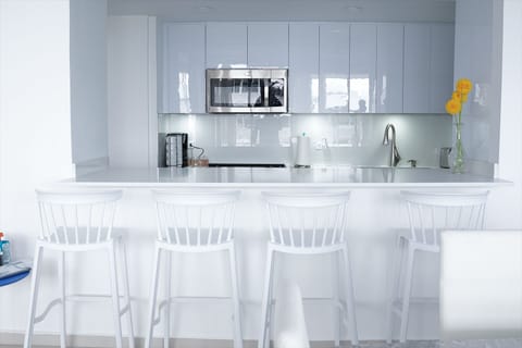 Fridge, oven, stovetop, dining tables