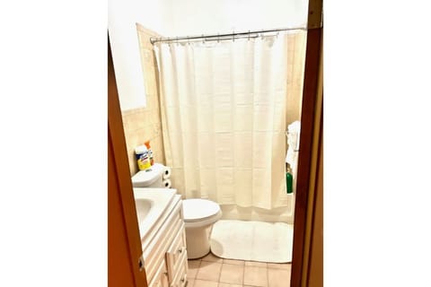 Combined shower/tub, hair dryer, towels, soap