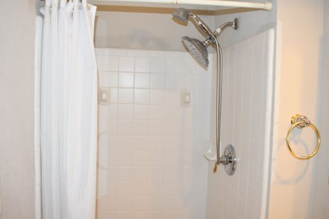 Combined shower/tub, hair dryer, towels, toilet paper