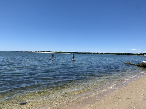 On the beach, sun loungers, beach towels