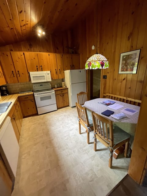Fully equipped kitchen with a breakfast nook.
