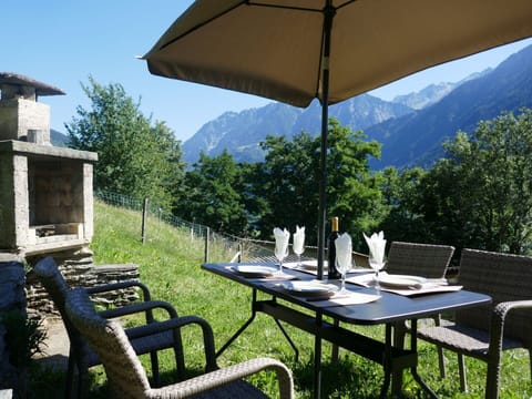 Table, Property, Furniture, Light, Plant, Umbrella, Shade, Sky, Outdoor Furniture, Outdoor Table