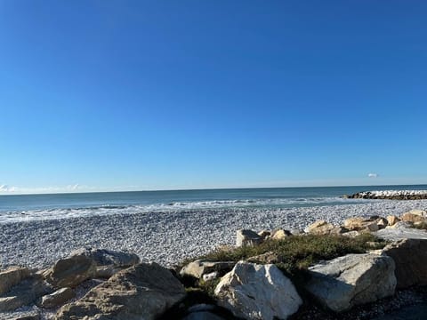 Beach nearby, sun loungers