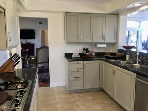 Kitchen with gas stove.
