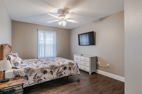 2ND BEDROOM WITH QUEEN BED DRESSER, 2 BEDSIDE TABLES AND 50" SMART TV