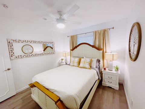 2nd bedroom.
Comfortable queen bed, earthy design, closet & Smart TV.