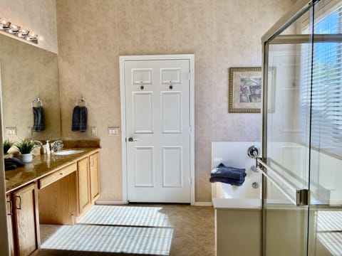 Combined shower/tub, hair dryer, towels, soap