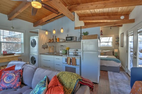 Hallway into bedroom area and French doors to deck