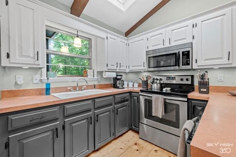 To the left, you'll see our fully stocked kitchen.