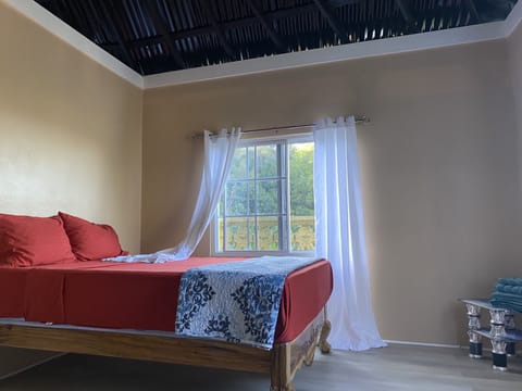 This is bedroom one, which has front and side views directly to the sea.