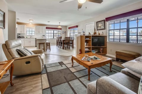 Can't Decide If You Want to Eat or Watch a Movie? - You don't have to here, The open floor plan allows you to do both!