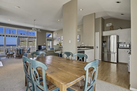 Stay Connected - With the dining table conveniently located next to all of the action, it's easy to stay engaged with friends and family while grabbing a quick bite to eat.