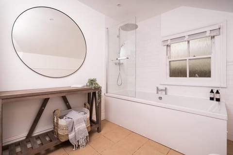 Combined shower/tub, hair dryer