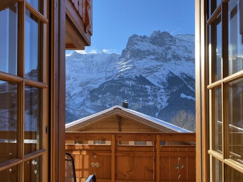 Sky, Property, Window, Snow, Wood, Mountain, Cloud, Shade, Door