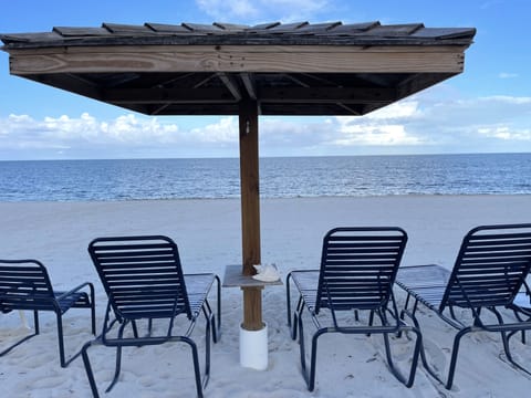 On the beach, sun loungers, beach towels