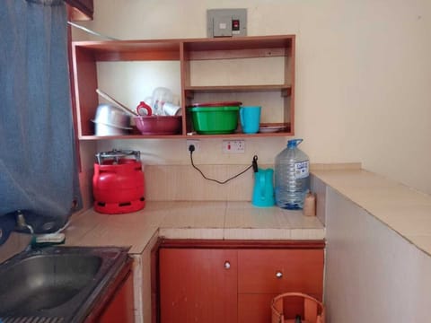 Fridge, electric kettle, cookware/dishes/utensils