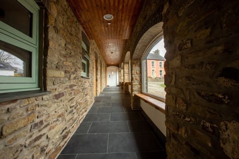 Glazed corridor access to bedrooms
