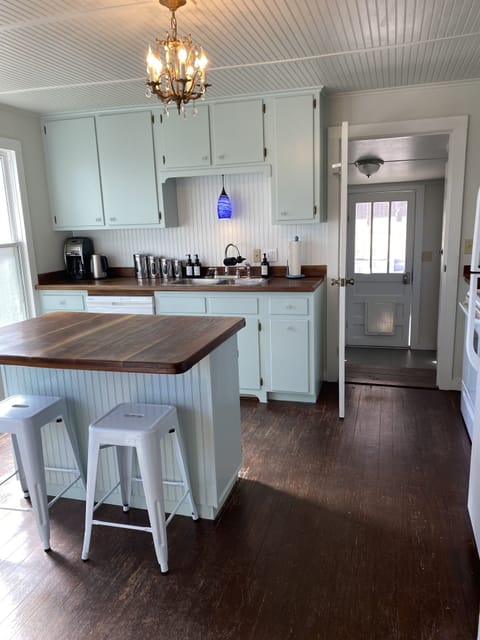 Rear laundry room and back door through kitchen