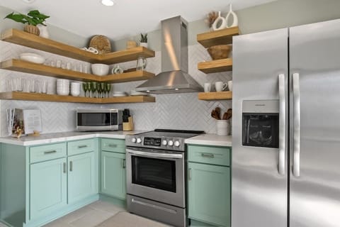 The kitchen has new stainless steel appliances and all the cooking basics & utensils! Imagine making a wonderful dinner here for family and friends!