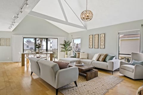 The magic of this coastal chic bungalow is being able to look out from the dining table to the oceanfront!