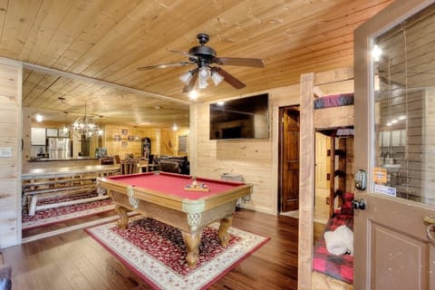 Enter in the side door that opens into the pool table area, followed by the dining area.