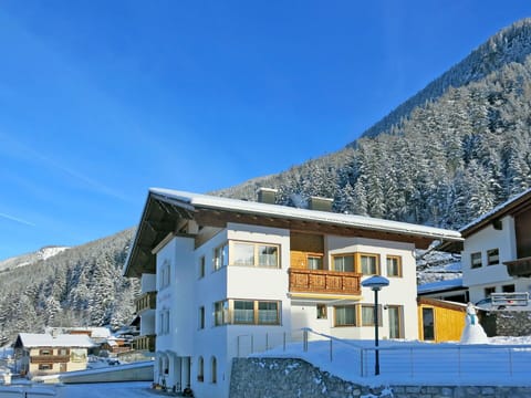 Sky, Building, Property, Window, Mountain, Blue, Snow, Slope, House, Cloud