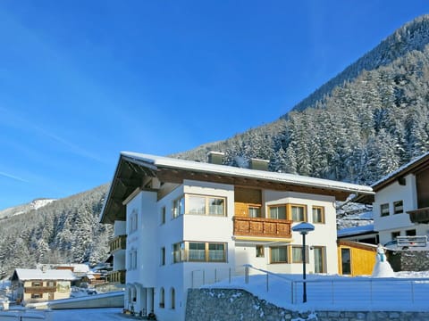 Sky, Building, Property, Window, Mountain, Blue, Snow, Slope, House, Cloud