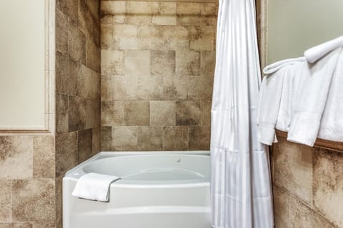 Bathtub, jetted tub, eco-friendly toiletries, hair dryer