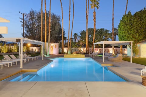 Plenty of seating and lounging by the pool for everyone in the group.