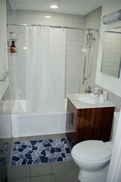 Combined shower/tub