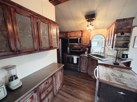 In the heart of the home, our fully equipped kitchen is a recipe for joy